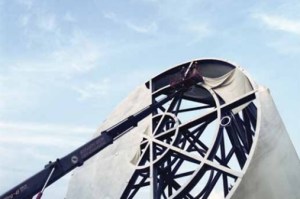 The outer material being removed [photo via http://prada-transformer.com/]